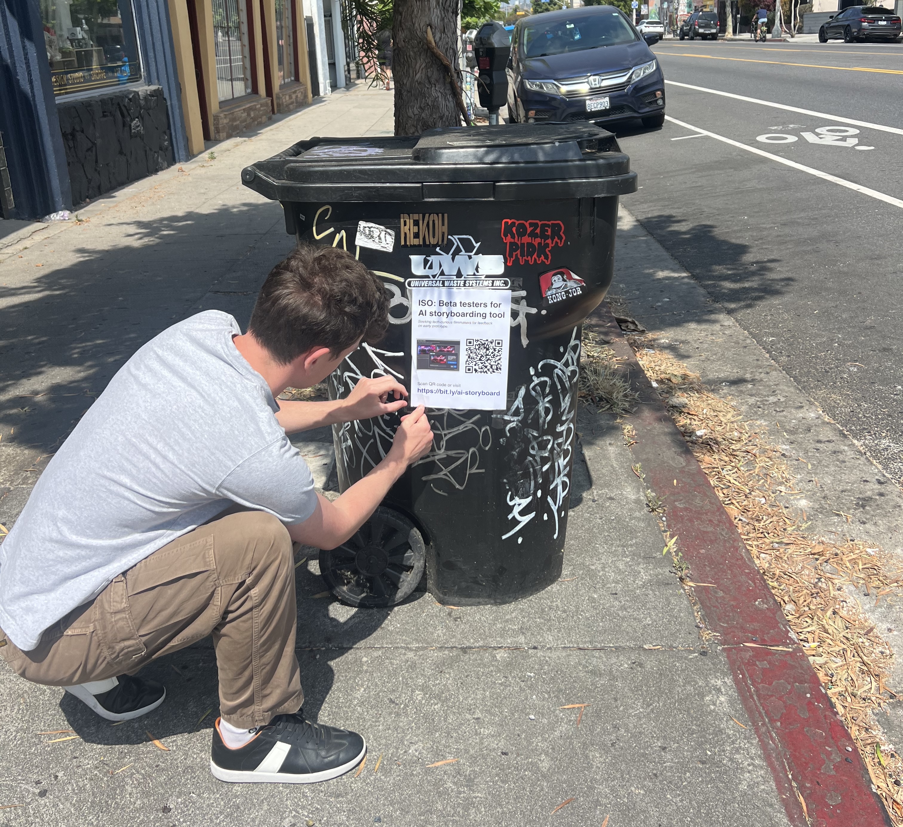 Poster for beta testers put up on a trash can